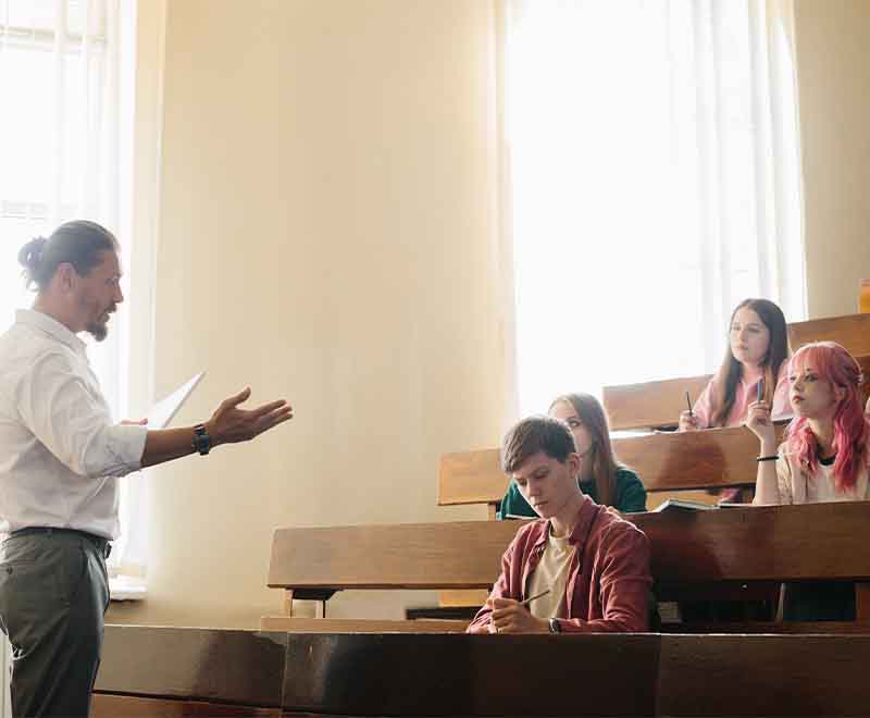 AM Ambassador working with small group of students