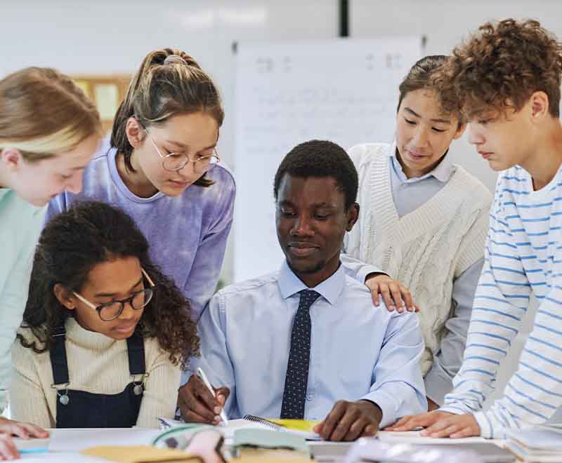 In-person professional development workshop with educators and community members learning trauma-informed classroom strategies and school culture practices.